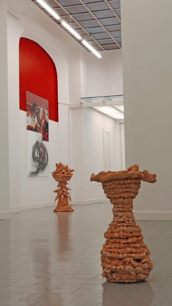 2011, Installation view showing two ceramic pieces 2011 (Laura flowering and Laura's mother)