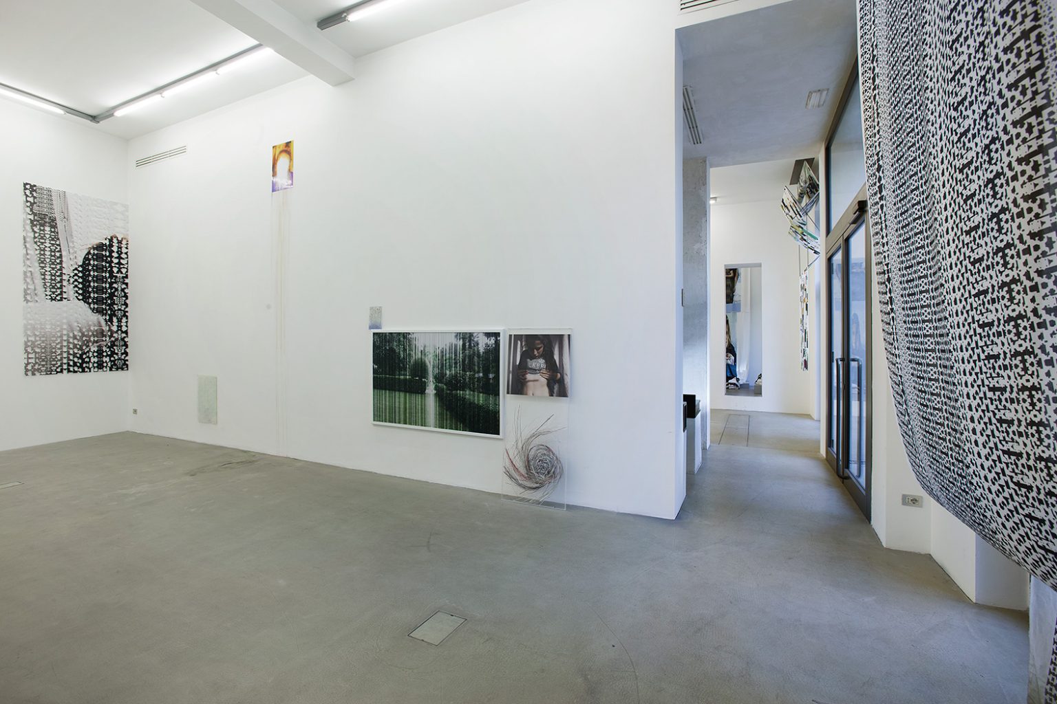 General view of Doing life installation main exhibition space 1 on right: By way of organized emptyness, 2012, Printed cotton