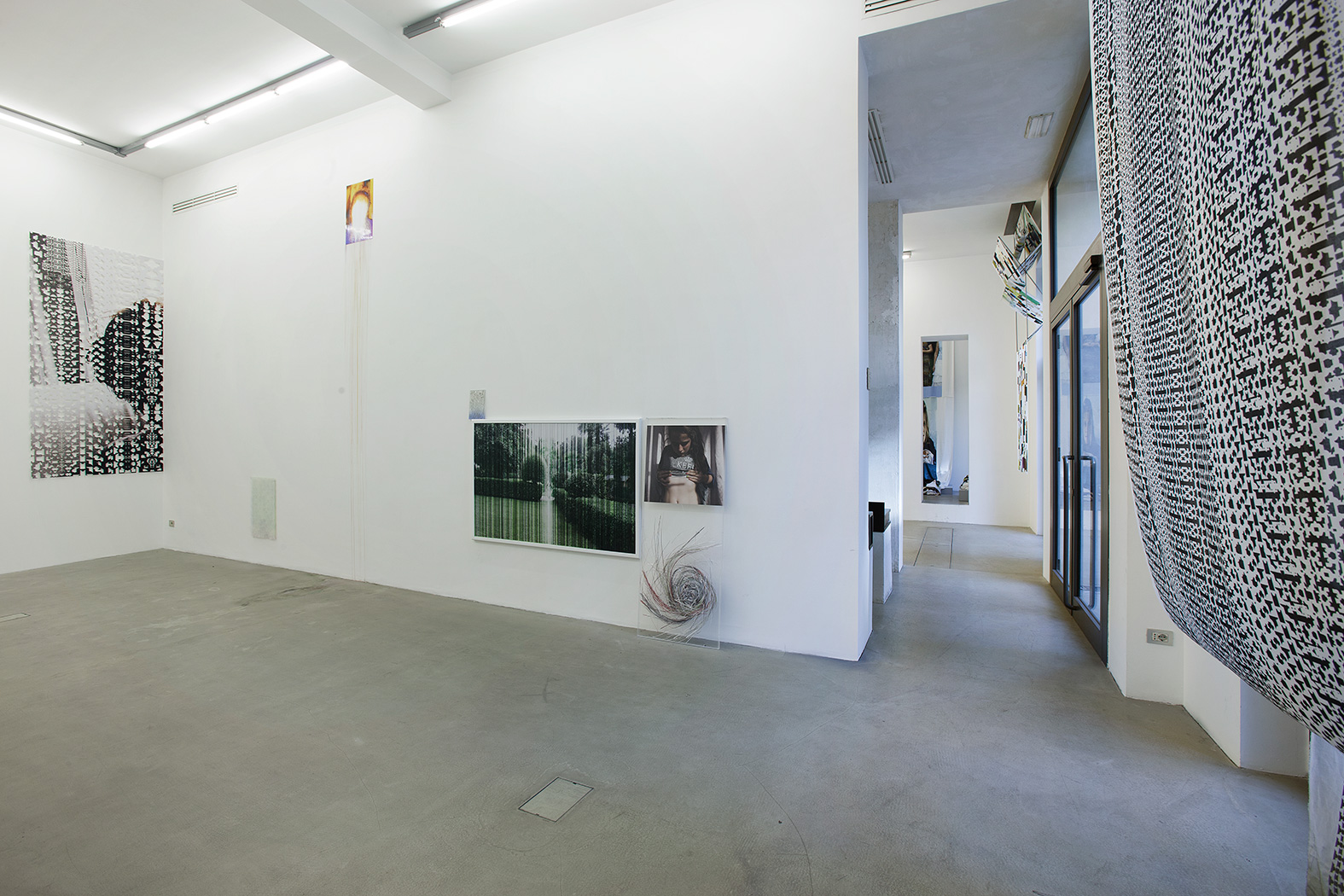 <p>General view of Doing life installation_2012, main exhibition space 1. On right: By way of organized emptiness_2012, printed cotton   </p>
