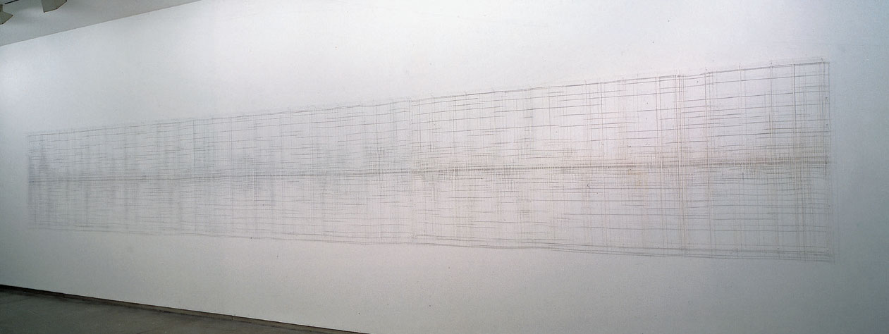 <p>Vanishing points: long white piece with colors (ocean horizon)_2001, variable dimensions, cut out photograph facing wall</p>
