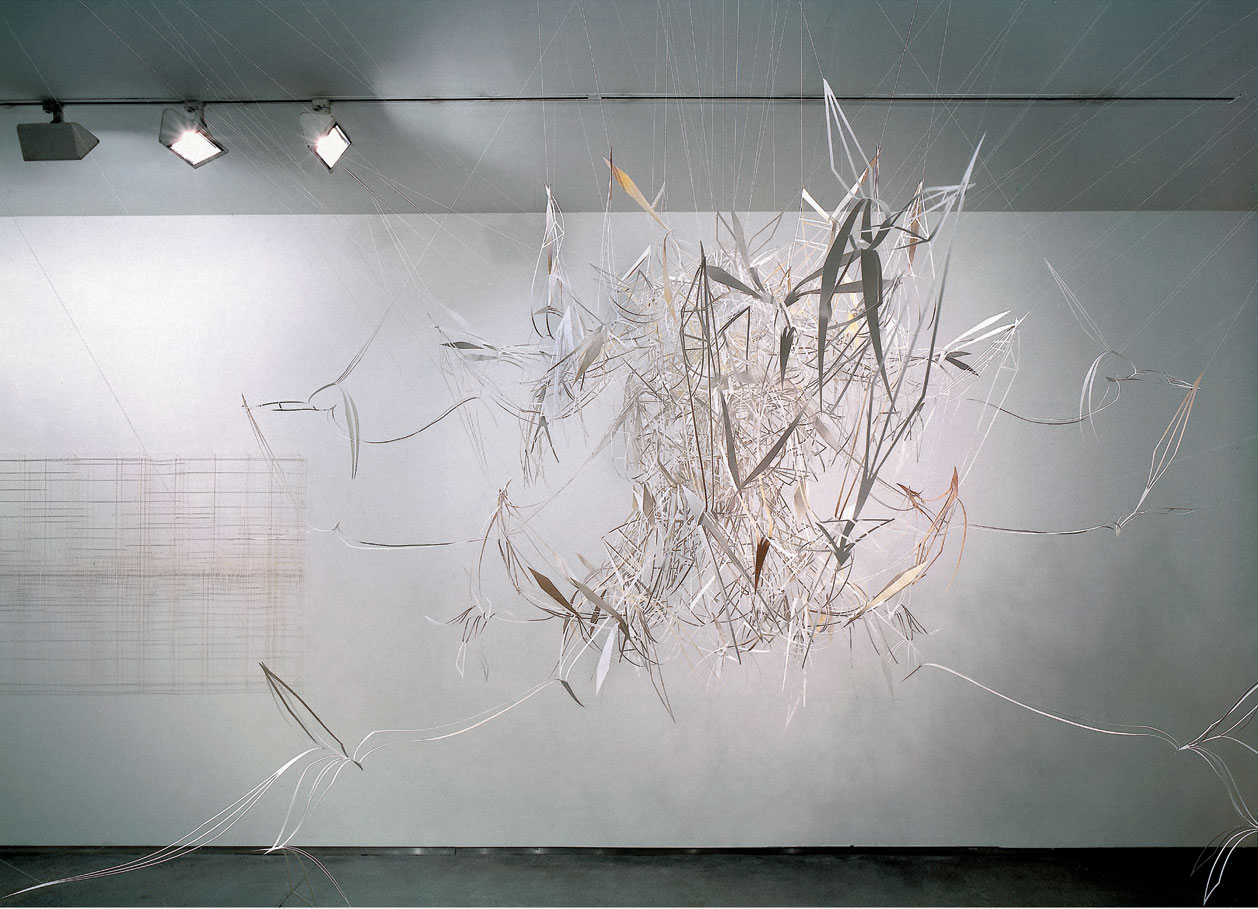 <p>Vanishing points: light piece with light (setting sun)_2001, 300&#215;300 cm, cut out photographs, thread, and glue  </p>
