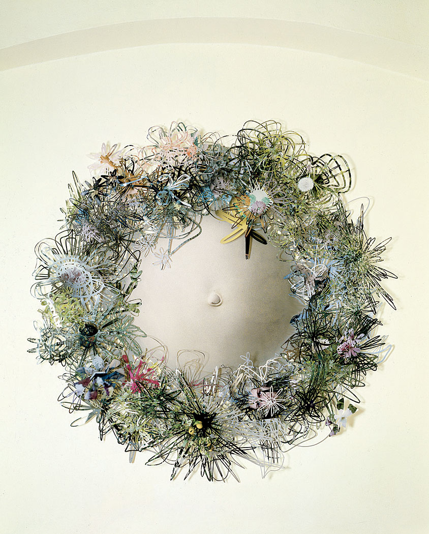 <p>Laura&#8217;s Belly (Blue, 2003), 140 cm diameter x 6 cm, cut out photographs and nails  </p>
