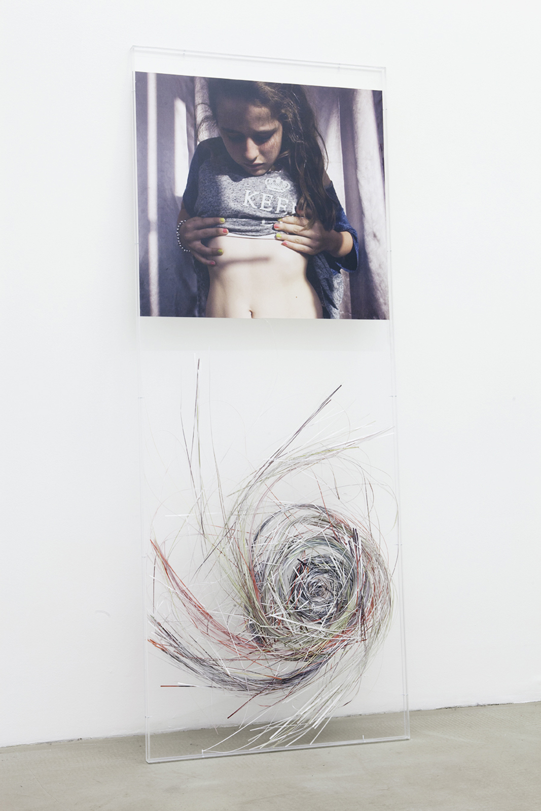 <p>Laura unraveling, with style_2012, 160&#215;60 cm, photo cut in to single, continuous, thread from bellybutton</p>
