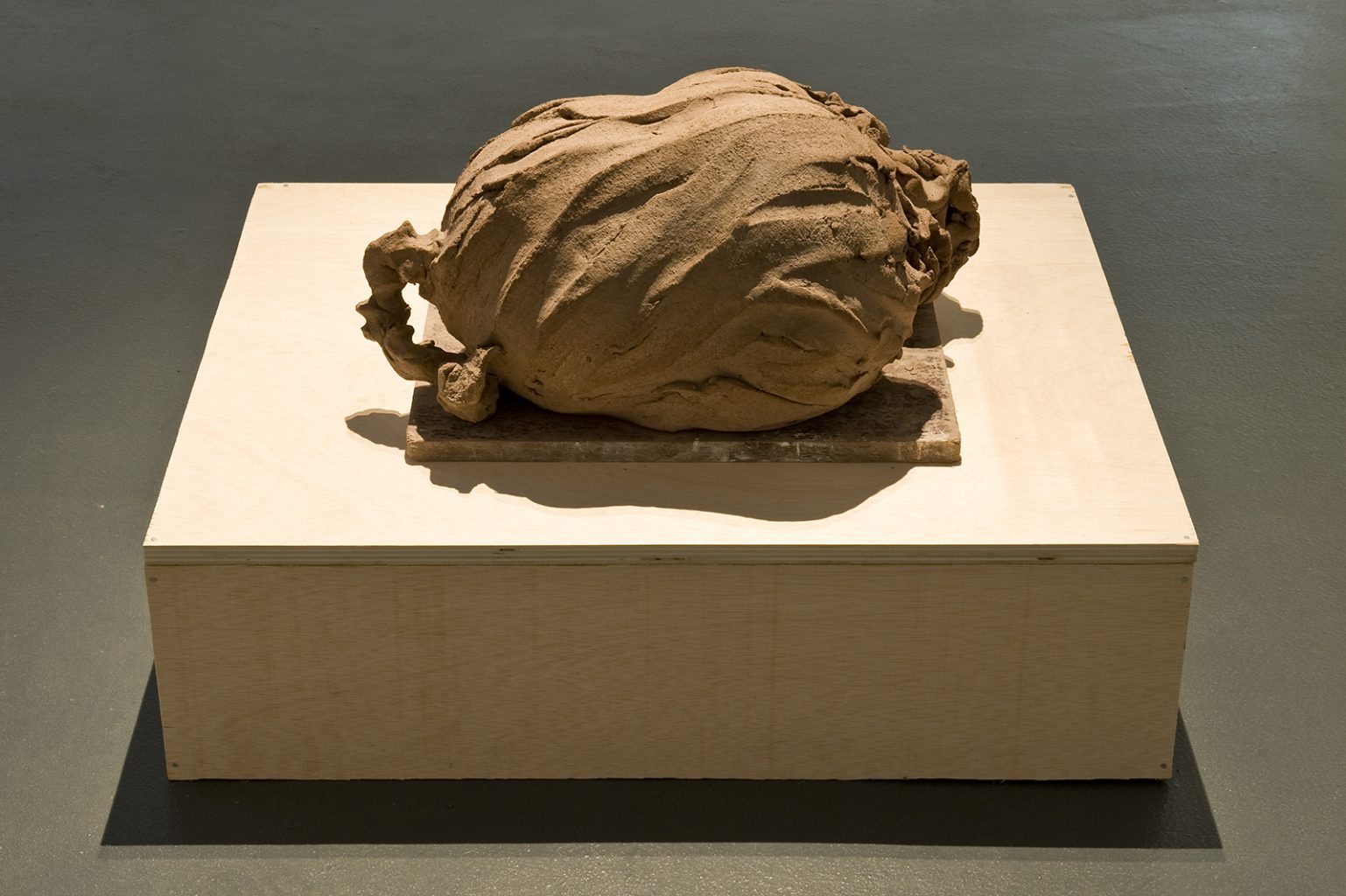 tending to a feeling of detachment, 2014, 30 x 40 x 56.5 cm, unfired clay and wood